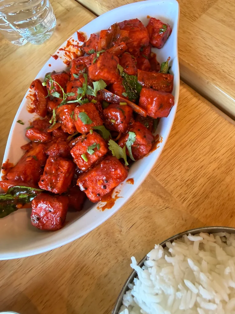 Bhimas paneer dish served with rice